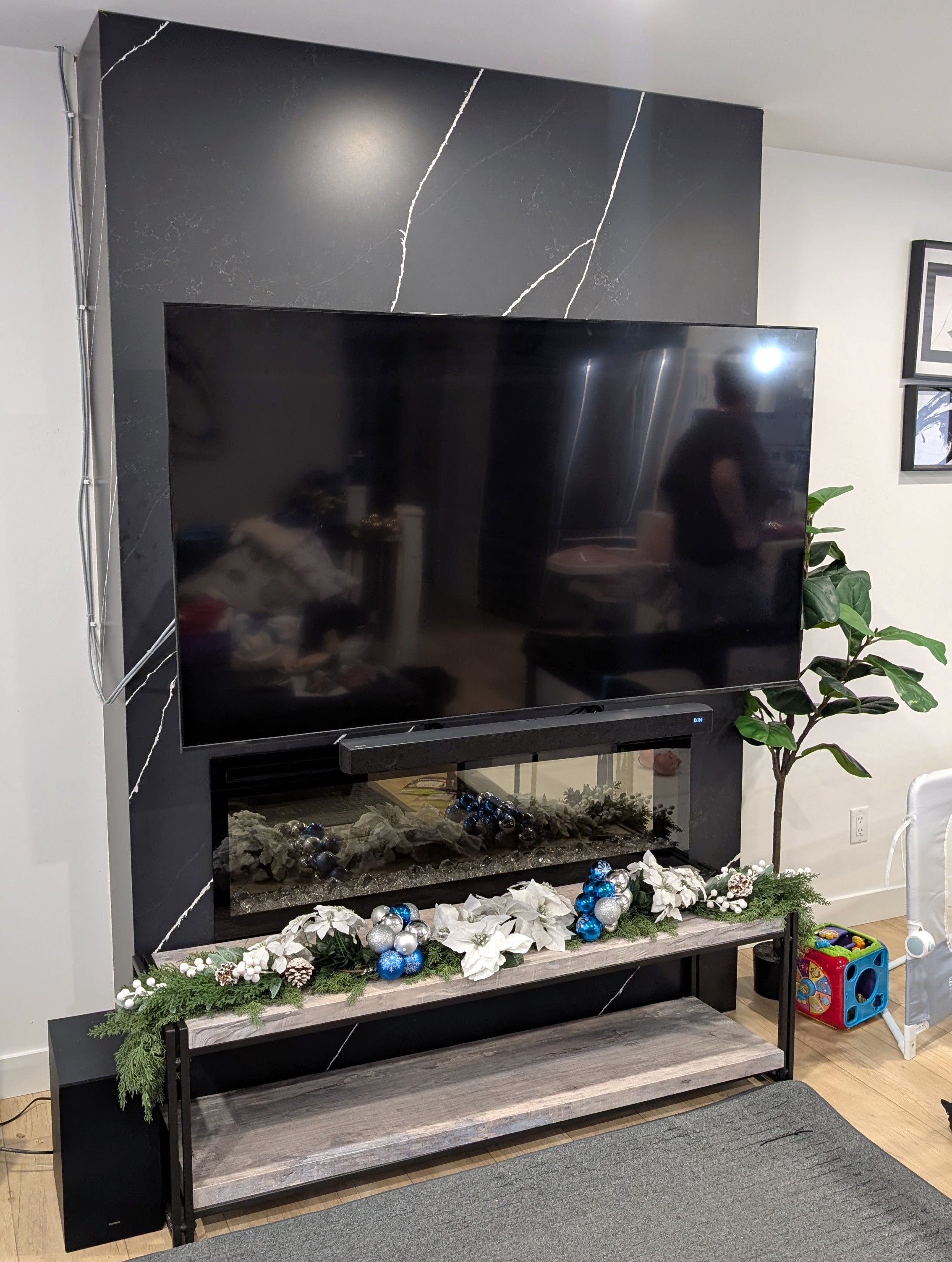 Completed mounting of a 62-inch TV in Calgary NE.