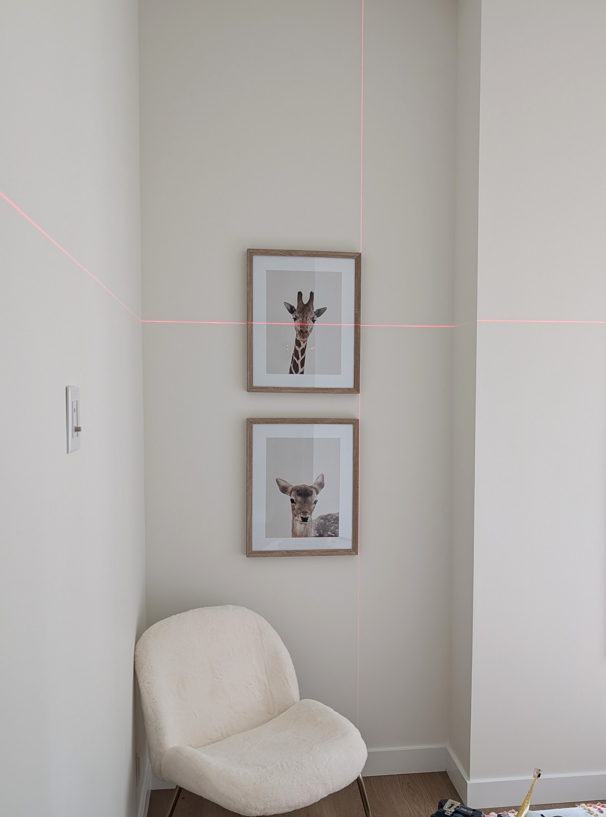 Framed art aligned and hung in Calgary NW.