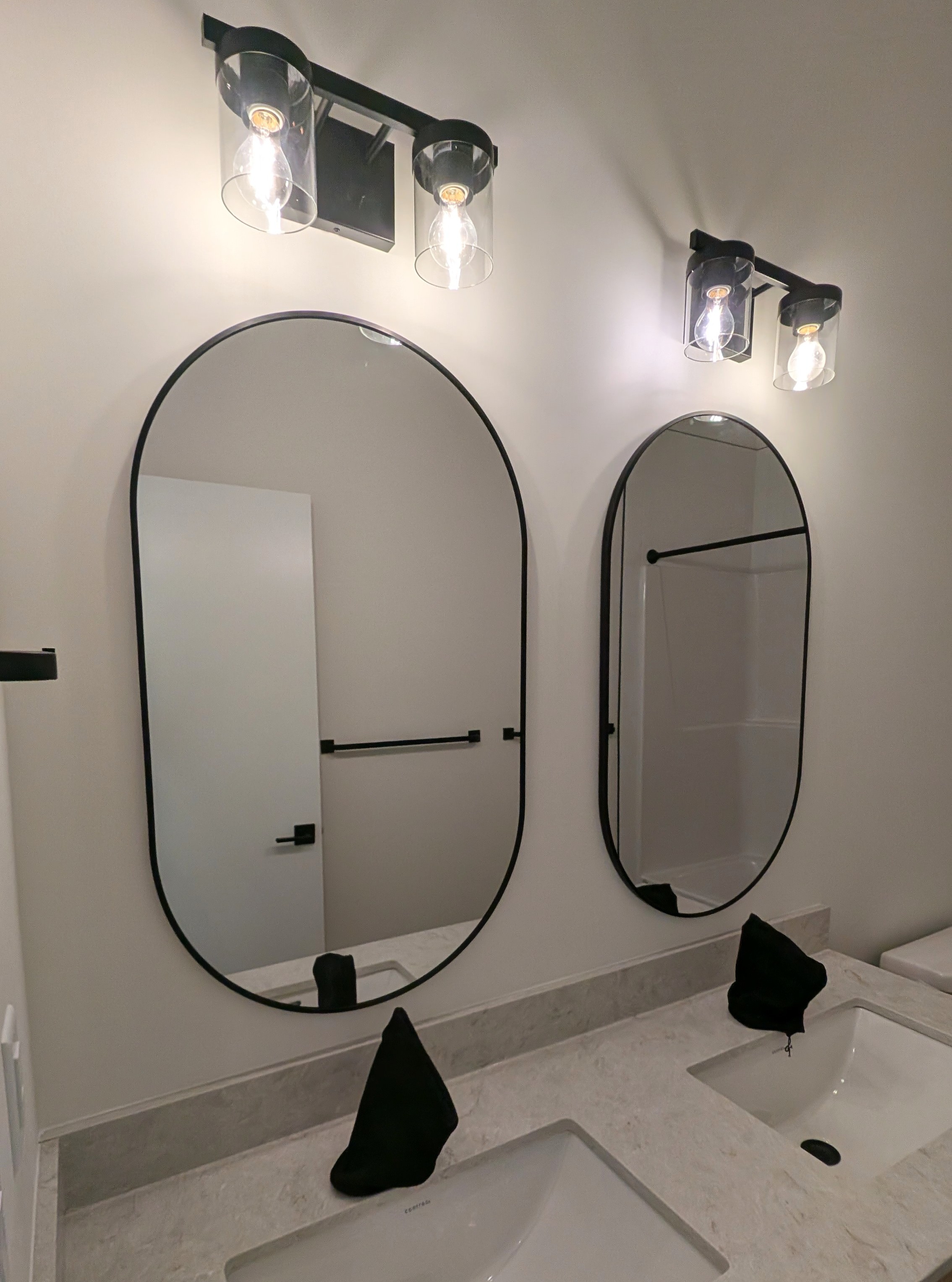 Bathroom mirrors installed in Calgary NW.