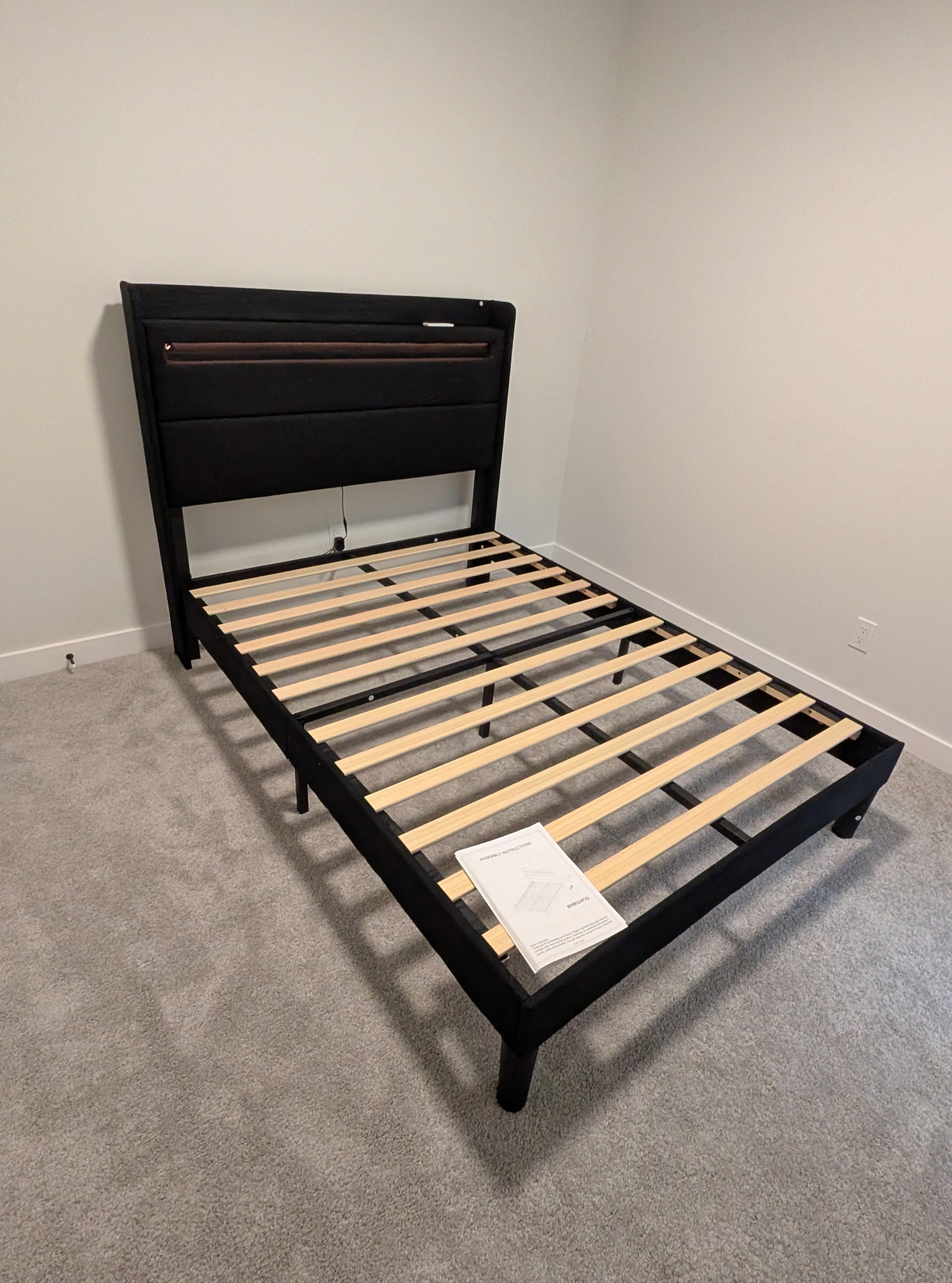 Upholstered bed frame assembled in Calgary.
