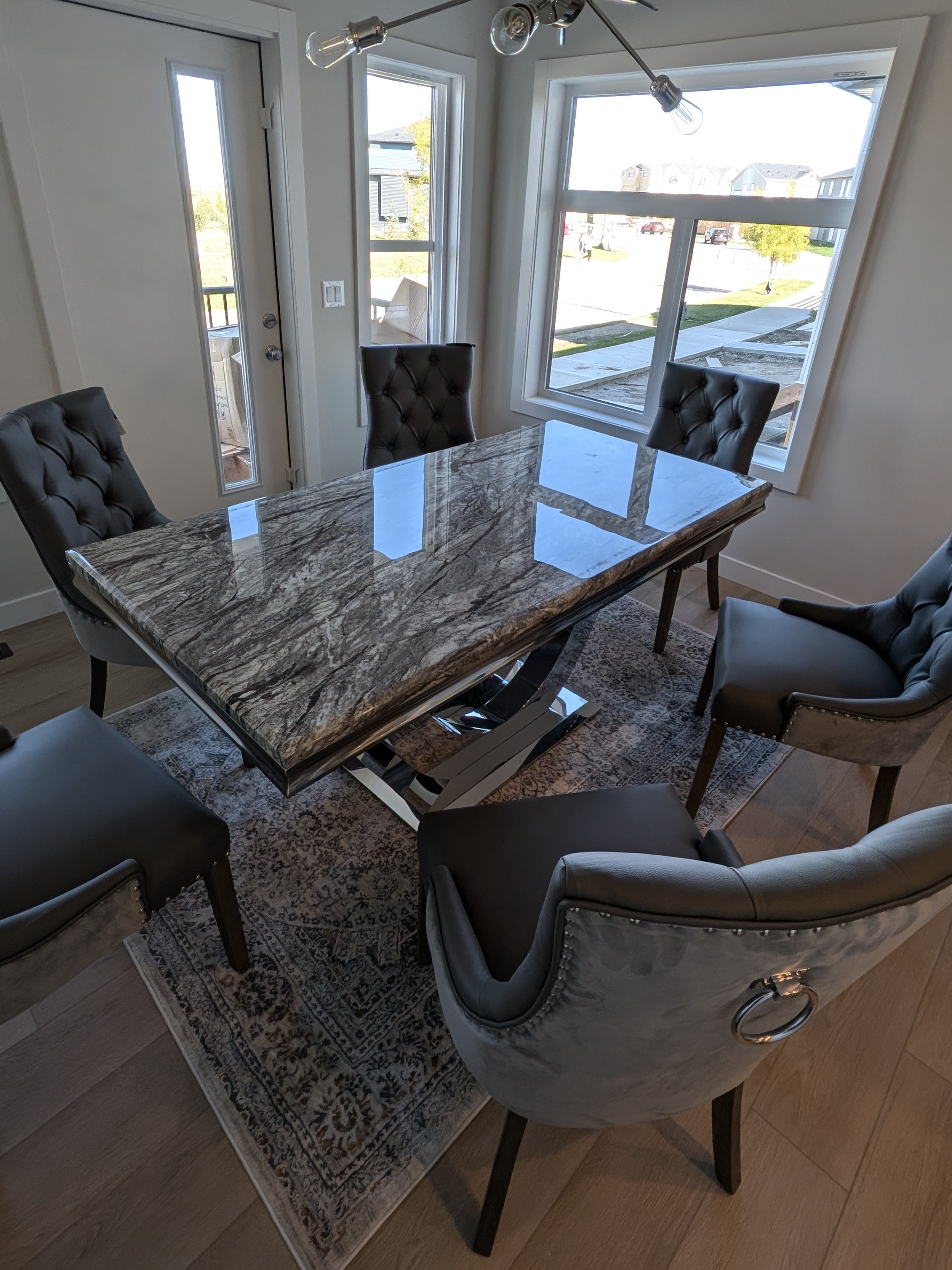 Dining table and chairs assembled in Calgary NE.