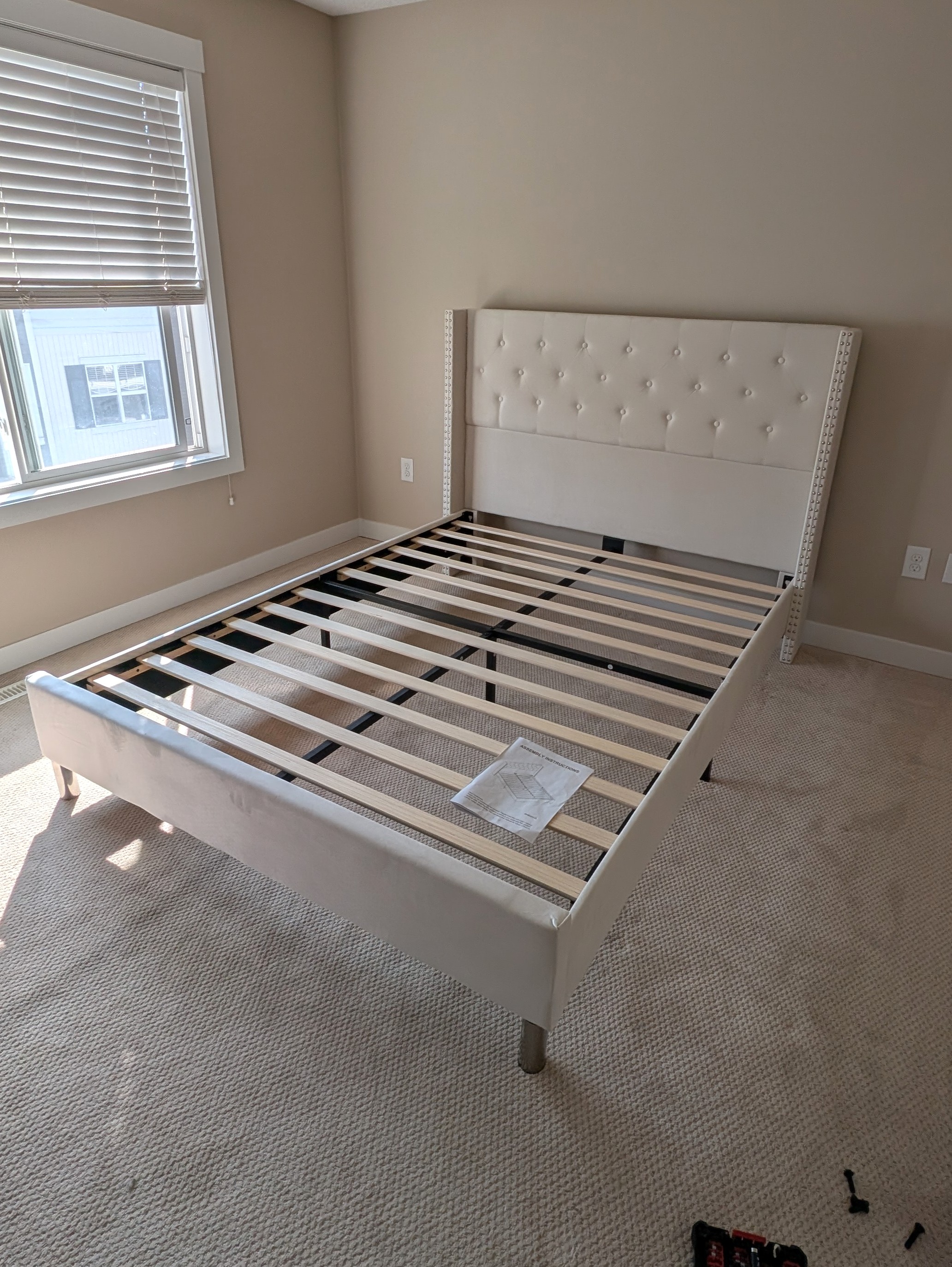 Queen bed frame assembled.