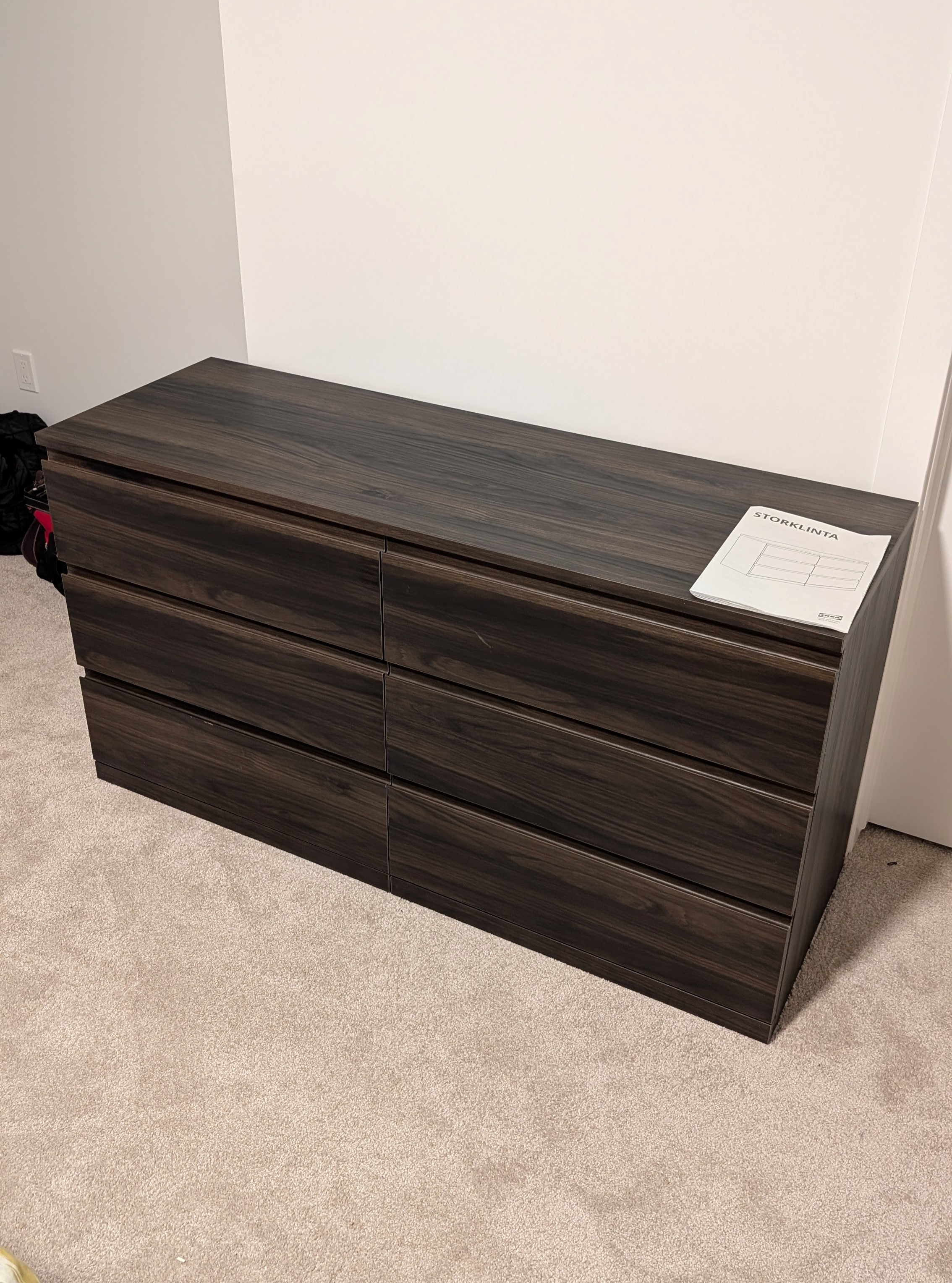 IKEA STORKLINTA 6-drawer dresser assembled in a Calgary bedroom.